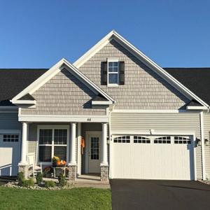 Single-story ranch townhomes for rent in Fairport NY with attached 2-car garage